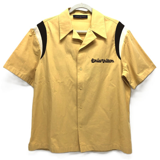 LOUIS VUITTON 1AFQ16 Embroidered Short Sleeve Cotton Bowling Shirt. Tyler collaboration with LV Jumping Dog. Spring/Summer 2024. Men's short-sleeved cotton shirt in beige.