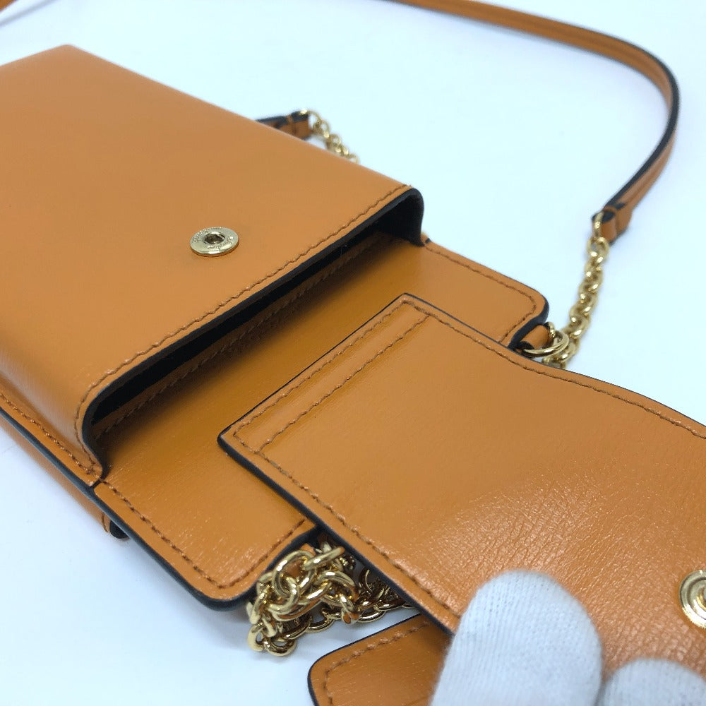 Salvatore Ferragamo Vara Leather Shoulder Bag with Chain, Crossbody Bag, and Phone Case, in Orange Brown and Orange.