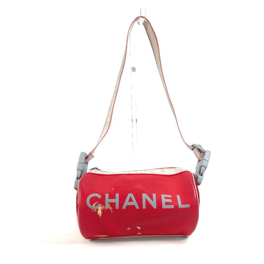 CHANEL Sport Two-Tone Logo Cylinder Shoulder Handbag in Rubber, Red