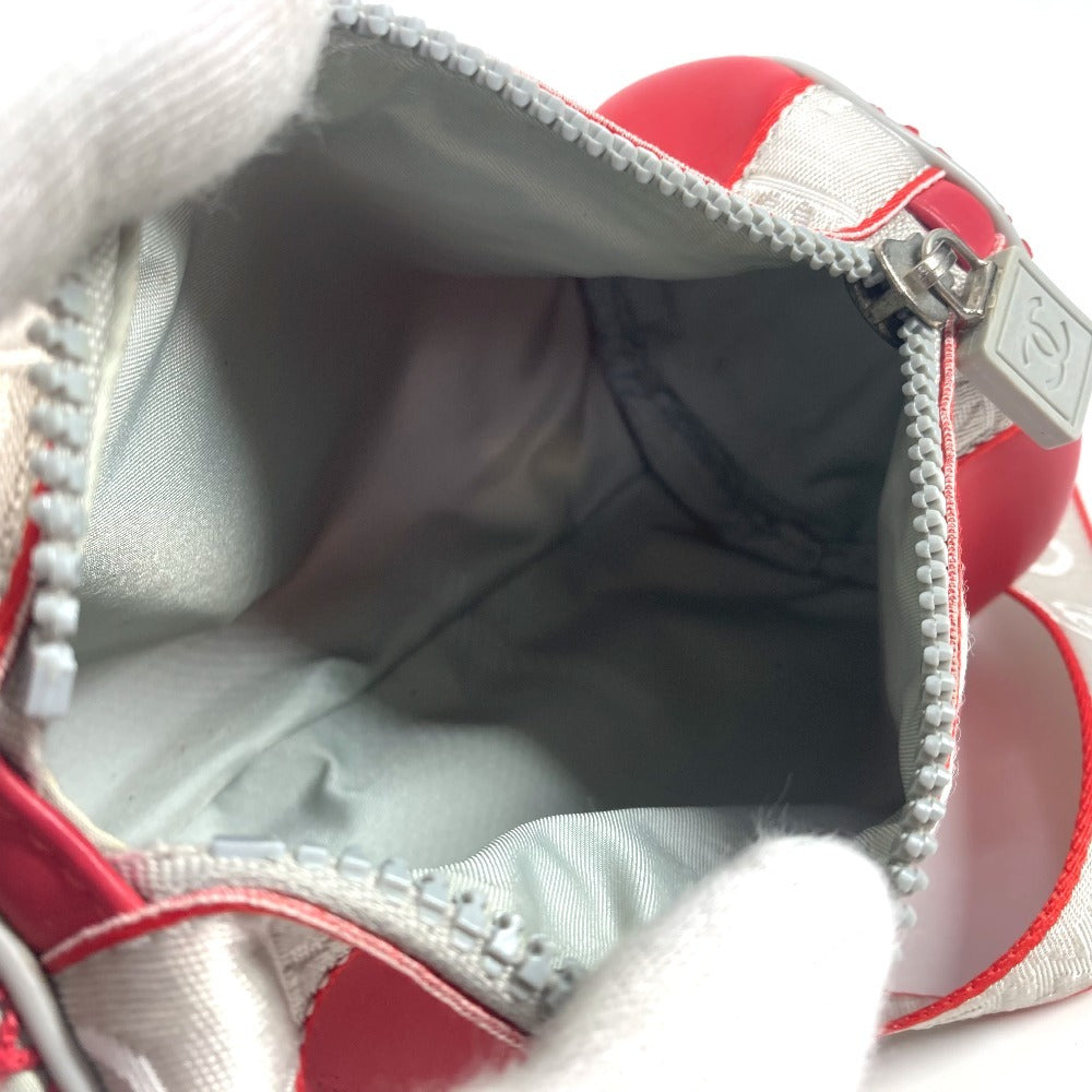 CHANEL Sport Two-Tone Logo Cylinder Shoulder Handbag in Rubber, Red