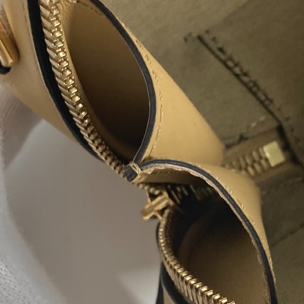 FENDI 8BS058 Small Orlock Mini Camera Case, a crossbody camera case. This 2-way bag can be used as a handbag or shoulder bag. Available in beige leather.