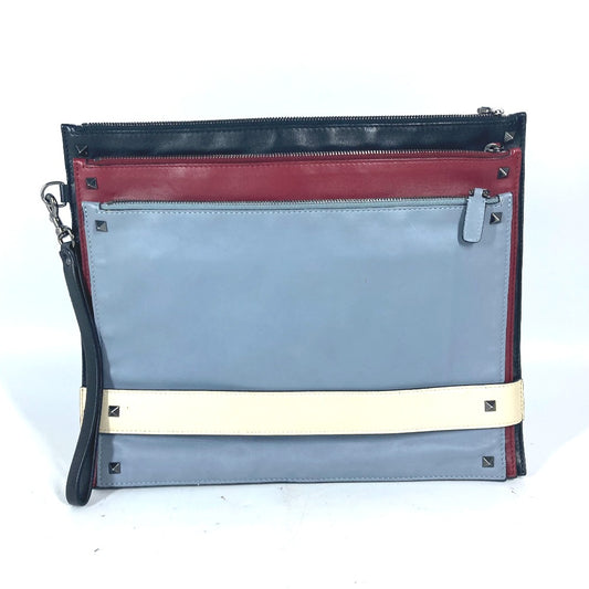 VALENTINO studded triple clutch bag in black leather, tricolor design.