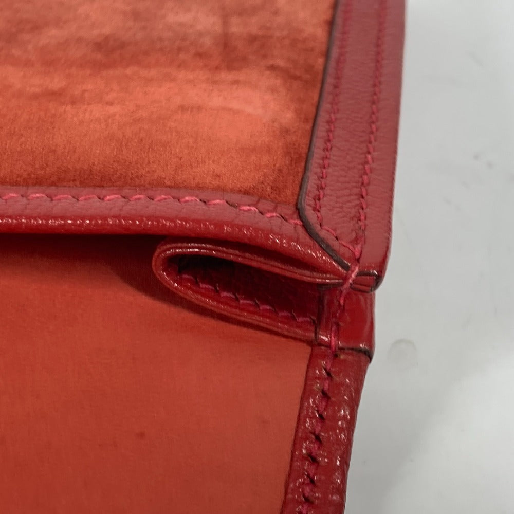 HERMES H logo Jige Elan clutch bag in red leather.