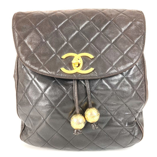 CHANEL Matelasse Quilted Vintage CC Coco Mark Logo Backpack with Coco Ball Drawstring and Chain, Women's Black Lambskin
