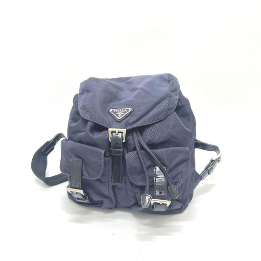 PRADA B6677 VELA โลโก้สามเหลี่ยม เพลทโลโก้สามเหลี่ยม กระเป๋า เป้สะพายหลัง ไนลอน ใช้ได้ทั้งชายและหญิง สีม่วง PRUGNA