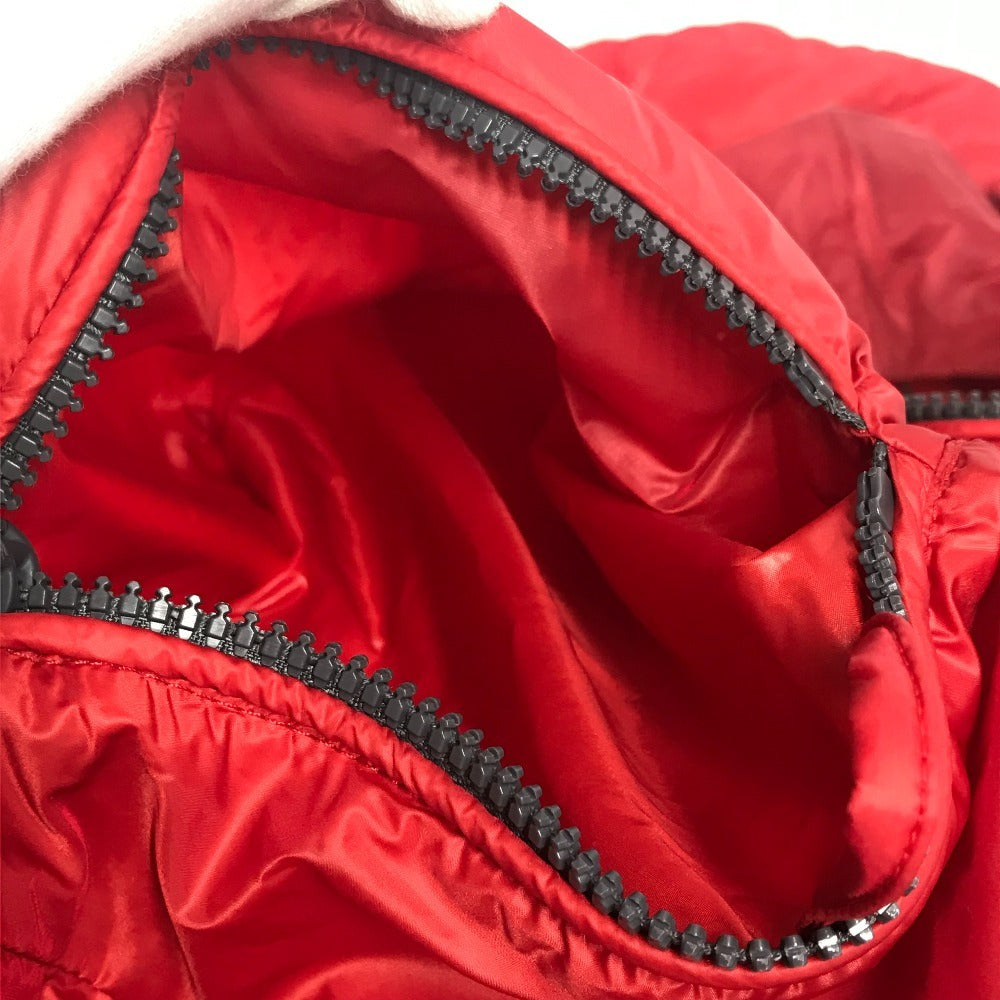 MONCLER Hever Gilet Hever Vest, a sleeveless down vest with a hood, available in red.