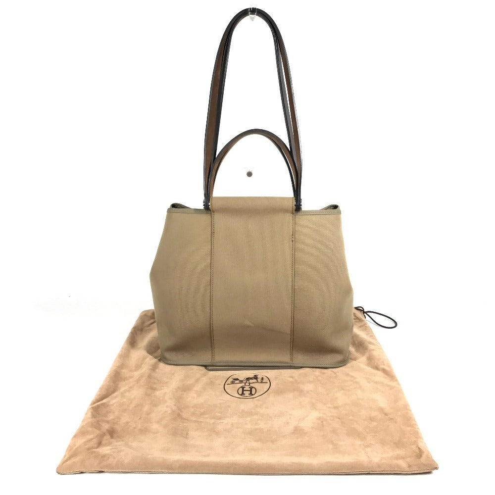 HERMES Cabag PM, a handbag/shoulder bag in brown leather/canvas.