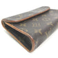LOUIS VUITTON M51855 Monogram Florentine Pochette, a women's bag, pouch, or waist bag in brown Monogram canvas.