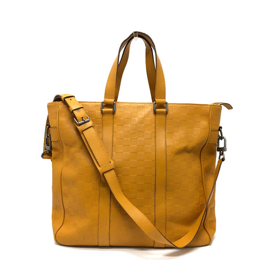 LOUIS VUITTON N41228 Damier Infini Tadao 2-Way Tote Bag in Damier Infini Leather, Men's Solar Yellow