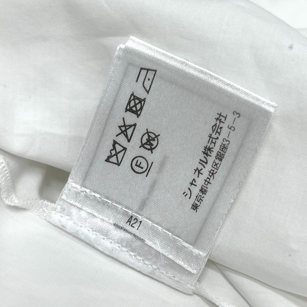 Chanel P59362 18a Button Rhinestone Button Ruffle Blouse Lengan Panjang Blaus Kapas Wanita Putih