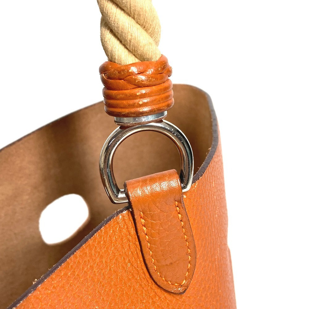 HERMES Manjoir MM Shoulder Handbag, Bucket-Shaped, with Rope Handles, Taurillon Clemence Leather, Orange, for Women