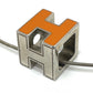 HERMES H Cube Carage d'Ache Necklace in Orange and Silver