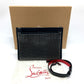 Christian Louboutin spiked studded Sky Pouch clutch bag in black leather.