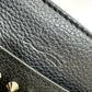 Christian Louboutin spiked studded Sky Pouch clutch bag in black leather.