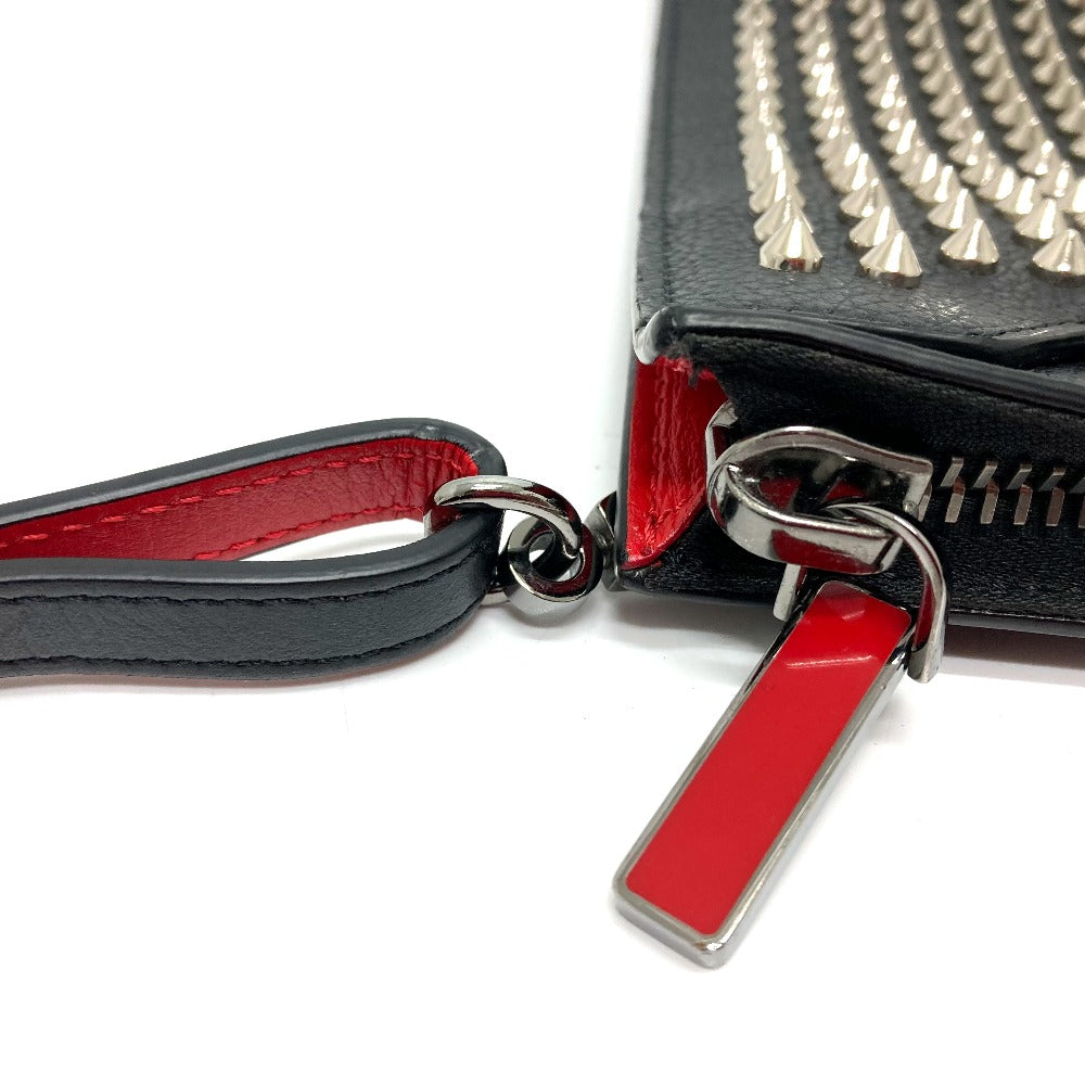 Christian Louboutin spiked studded Sky Pouch clutch bag in black leather.