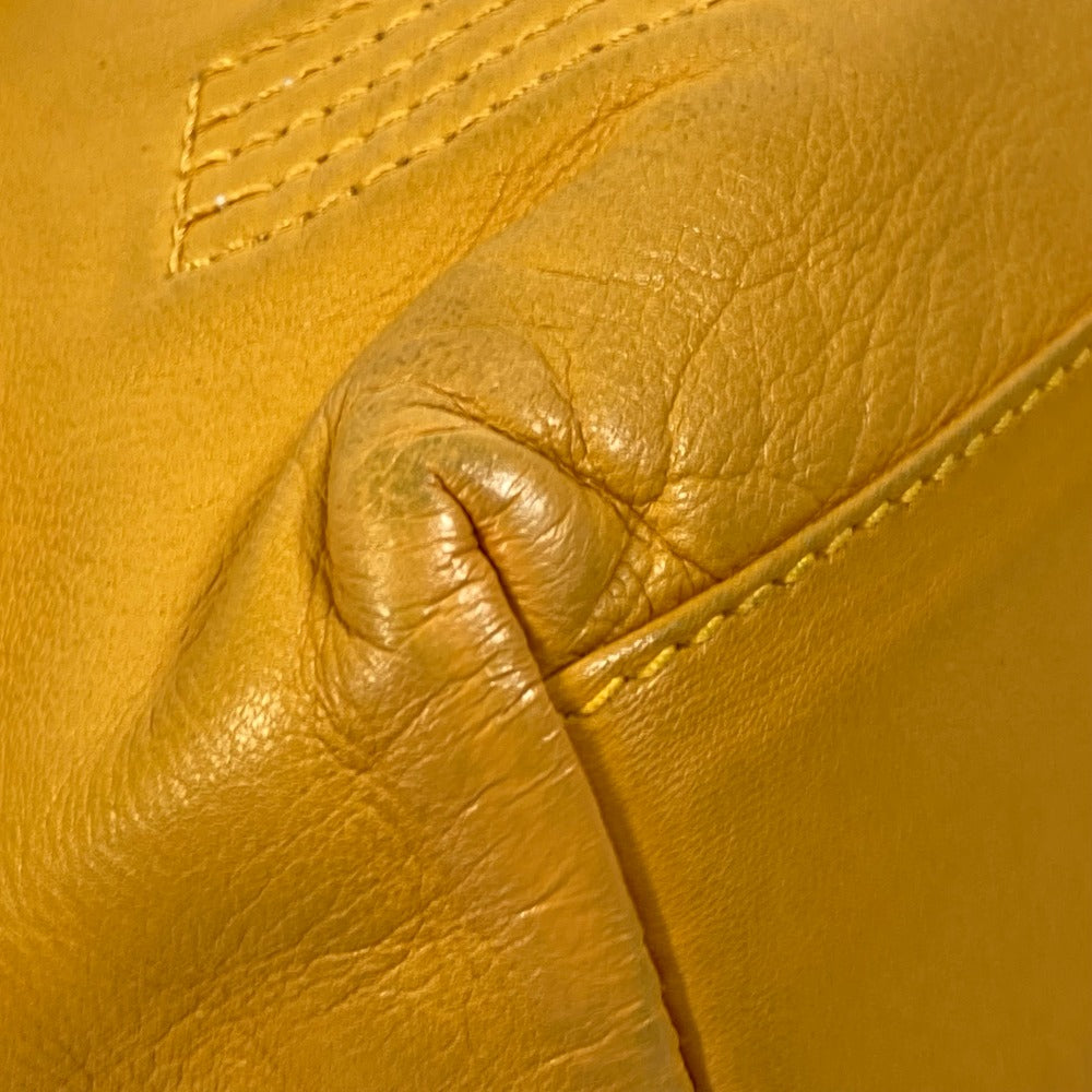 CHANEL CC Coco Mark Drawstring Chain Backpack Shoulder Bag in Lambskin, Yellow