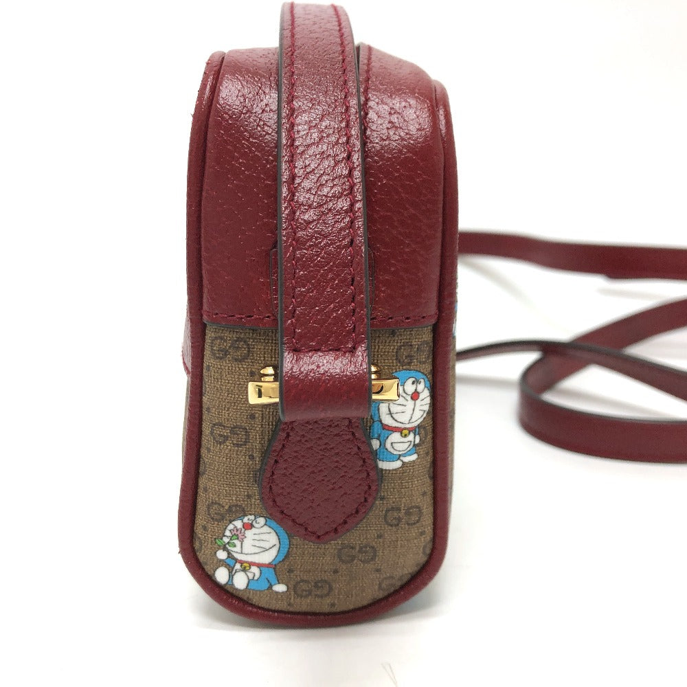 GUCCI 647784 GG Supreme Doraemon x GUCCI Shoulder Bag in GG Supreme Canvas, Brown, Women's