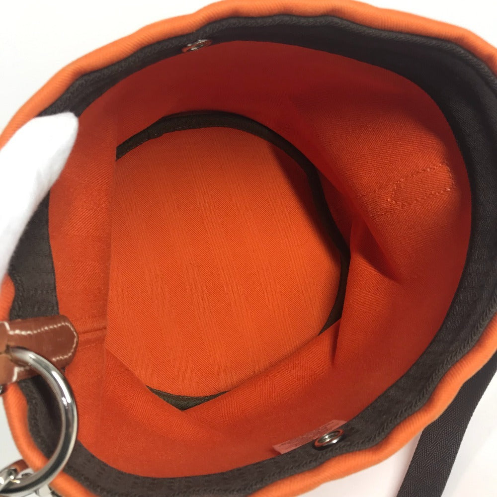 HERMES Sac de Pansage crossbody bucket-shaped shoulder bag with pouch, cotton, unisex, orange