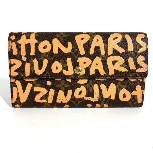 LOUIS VUITTON M92190 โพเชทท์ ปอร์เต้-โมเน่ เครดิต (Pochette Porte-Monnaie Credit) ลายโมโนแกรม กราฟฟิติ รุ่นเก่า กระเป๋าสตางค์แบบพับสองทบ ทรงยาว กระเป๋าสตางค์ใบยาว แคนวาสลายโมโนแกรม กราฟฟิติ สีส้ม สำหรับทุกเพศ