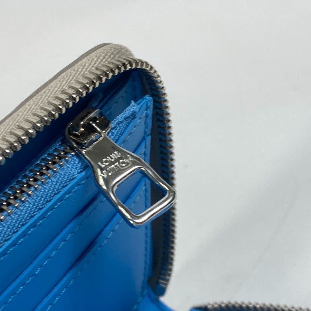 루이비통 M81573 모노그램 지피 지갑 세로형 라운드 지퍼 장지갑 토리옹 가죽 남성 그레이