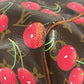 LOUIS VUITTON M95011 Monogram Cherry Keepall 45 by Takashi Murakami. This travel Boston bag is crafted in Monogram Cherry canvas and is available in brown.