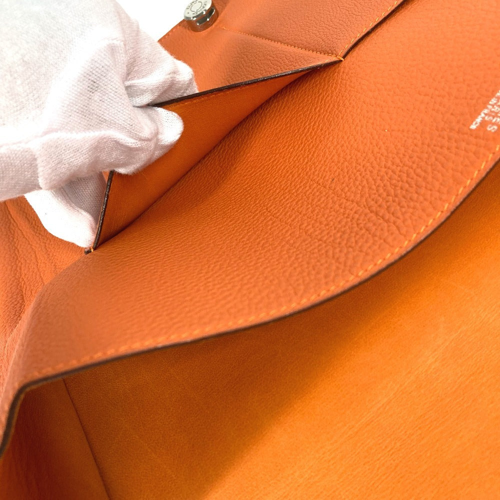 HERMES Dogon Meeting กระเป๋าเอกสาร กระเป๋าคลัตช์ ฝาพับ หนัง Taurillon Clemence Unisex สีส้ม